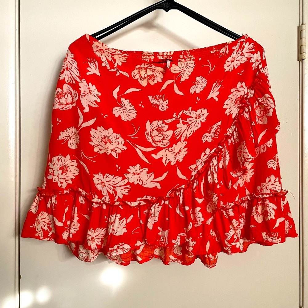 Mini skirt with matching midriff tank .